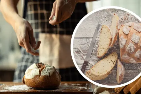 Ręce posypują mąką świeżo upieczony chleb na kamieniu. Obok pokrojone kromki i nóż.